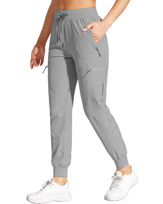 Pantalones deportivos ligeros tipo cargo para mujer con bolsillos con cremallera